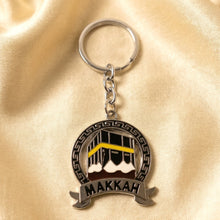 round metal keychain with Makkah mosque design