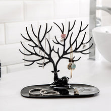 Deer-shaped jewellery holder side view India