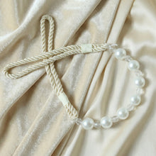 Stylish window drapery tieback