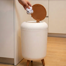 Compact plastic waste bin for home