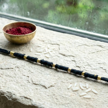 Handmade Black Thread Bracelet Rakhi with Gold Beads (1 Pc)