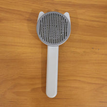 Reusable pet shedding needle comb