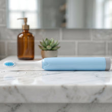 Electric Toothbrush on Bathroom Counter