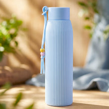 stylish blue glass drinking bottle
